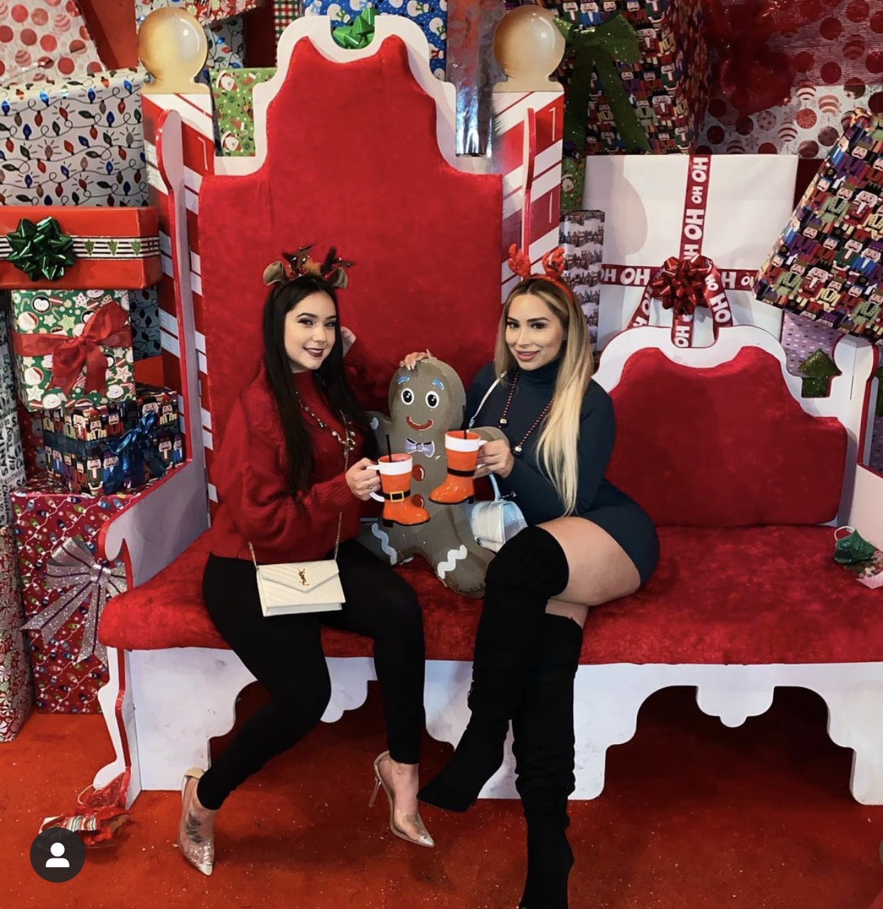 Holiday themed pop-up bar with oversized Santa throne and gift-wrapped installation