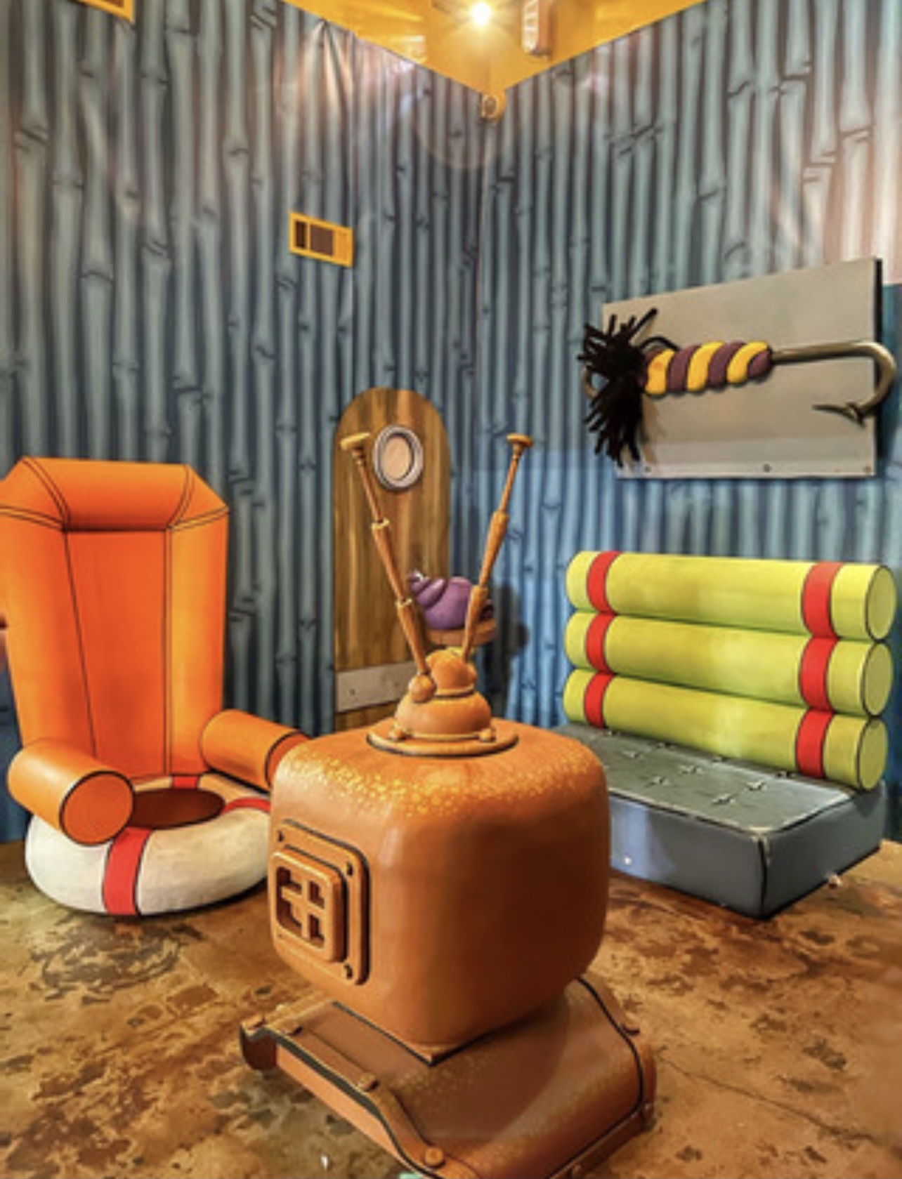 Immersive cartoon-inspired pop-up set design with hand-built custom props